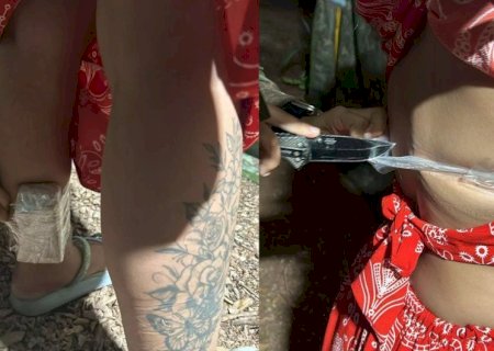 MULHER É DETIDA COM DROGAS AMARRADAS AO CORPO COM FITA ADESIVA